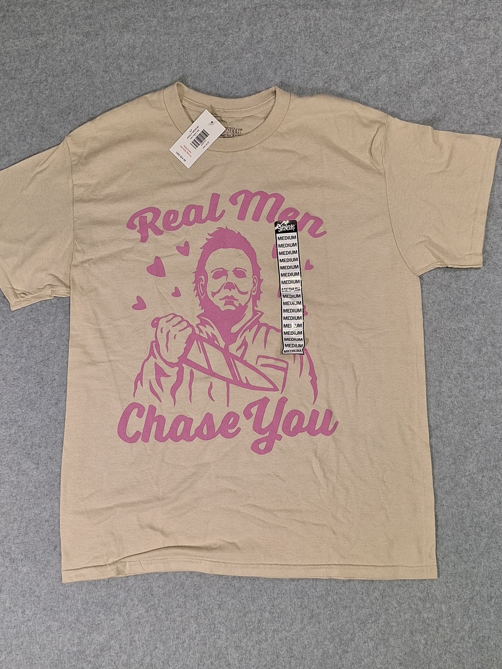 NWT Spencer's Michael Myers Tee with Pink Graphic "Real Men Chase You" Size M